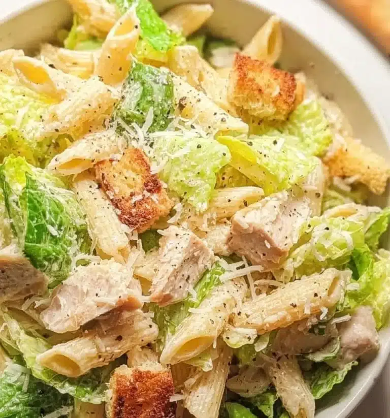 Delicious Caesar Pasta Salad with romaine, croutons, and creamy dressing