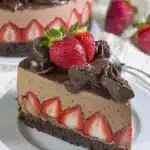 Decadent Chocolate Strawberry Mousse Cake layered with rich chocolate and fresh strawberries