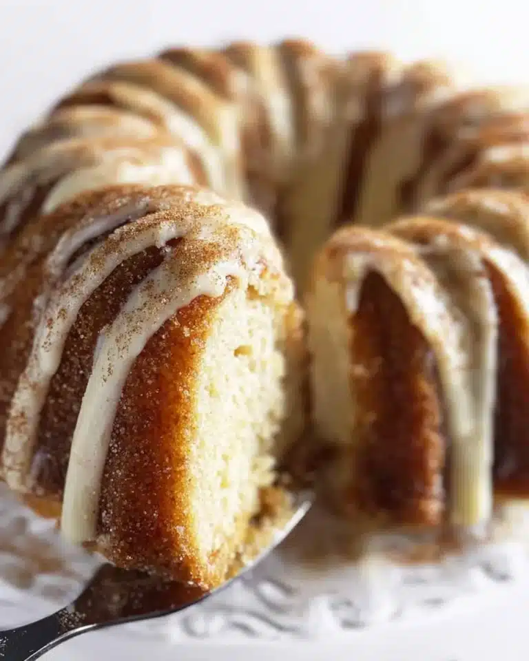 Deliciously baked Churro Cake with cinnamon sugar topping