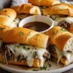 Crockpot French Dip Sandwiches served with savory au jus for dipping