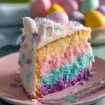 Delicious Easter Bunny Cake decorated with colorful icing and chocolate.