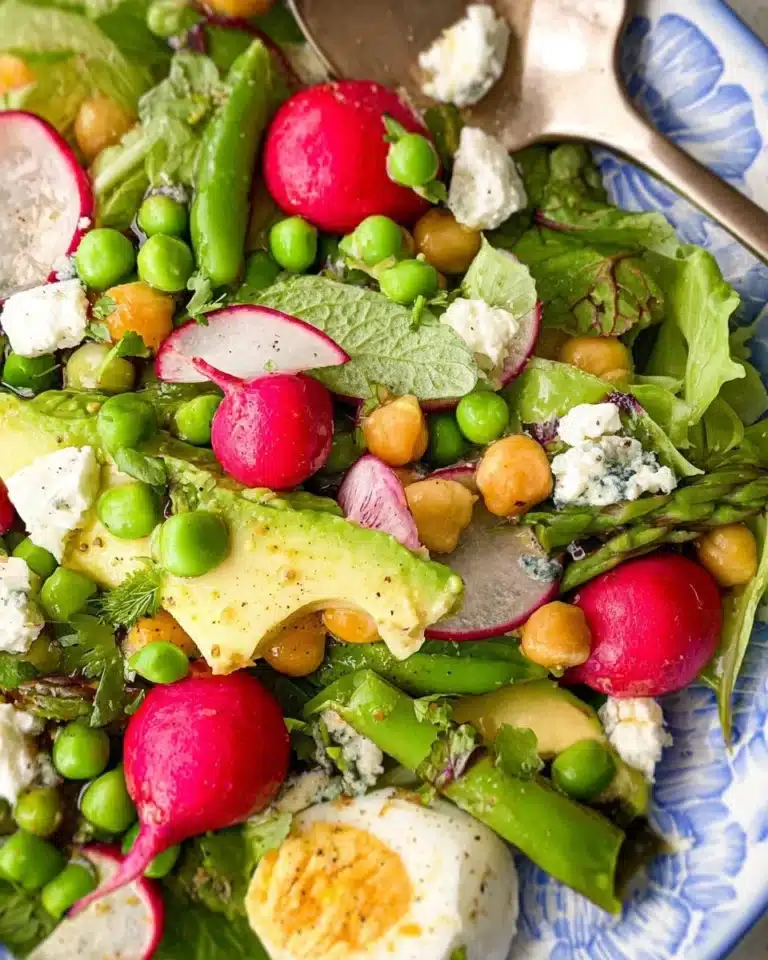 Easter Spring Salad with Goat Cheese, featuring fresh vegetables and vibrant colors