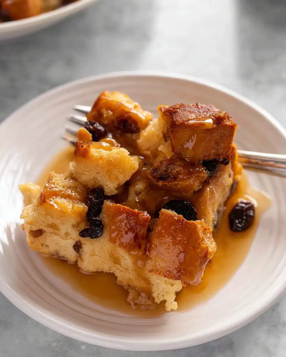 Delicious Irish Bread Pudding drizzled with creamy sauce