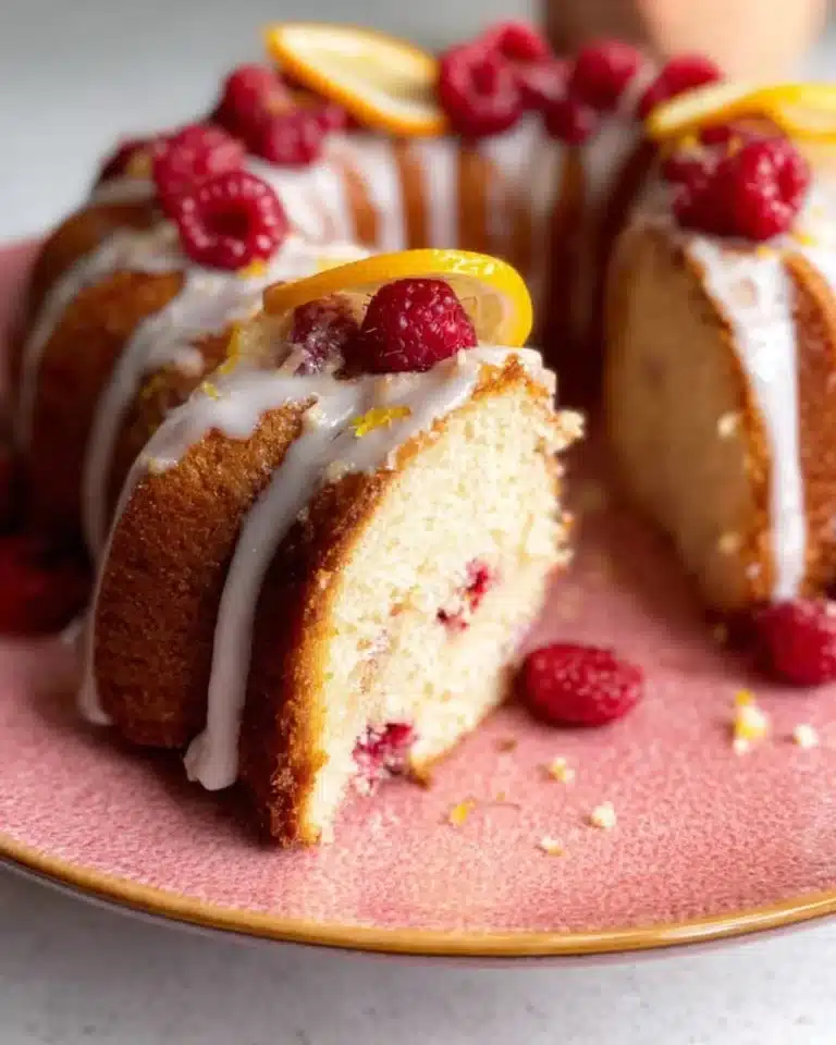 Delicious Lemon Raspberry Bundt Cake with fresh raspberries and a lemon glaze
