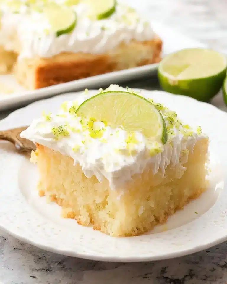 Delicious Margarita Poke Cake topped with lime and tequila flavors
