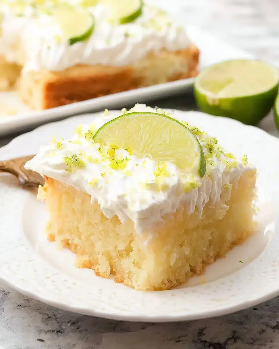 Delicious Margarita Poke Cake topped with lime and tequila flavors