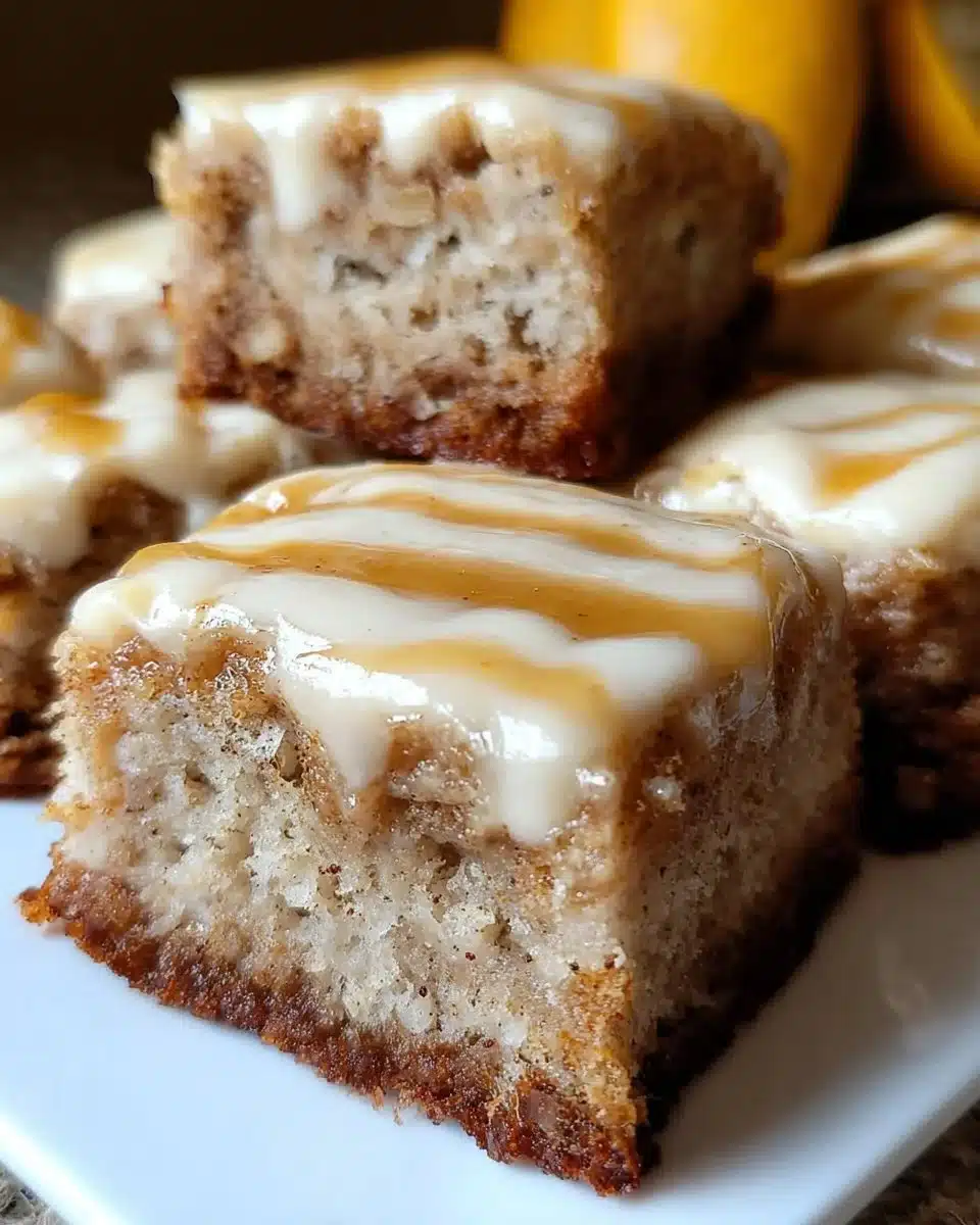 Delicious ooey gooey banana bars topped with banana slices and drizzled with caramel