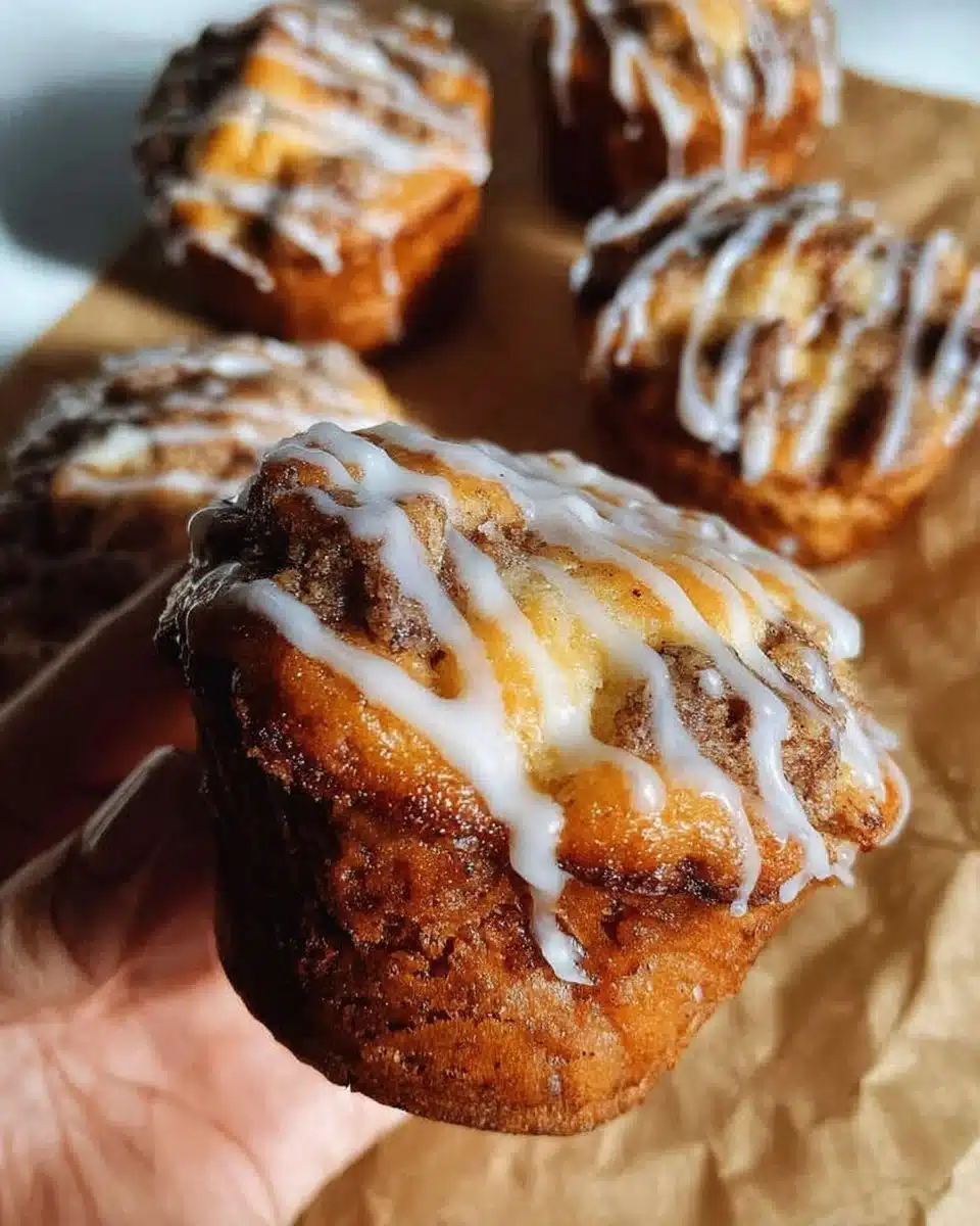 Freshly baked sourdough coffee cake muffins on a wooden table