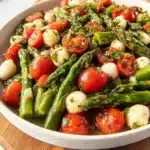 Fresh Asparagus and Tomato Salad with vibrant vegetables and dressing