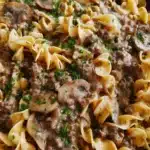 Delicious Beef Stroganoff Casserole topped with herbs and spices