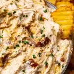 Delicious homemade French Onion Dip served with fresh vegetables and chips.