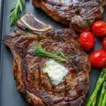 Juicy grilled ribeye steak cooked to perfection on a barbecue grill