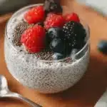 Delicious Keto Chia Seed Pudding topped with fresh berries in a bowl
