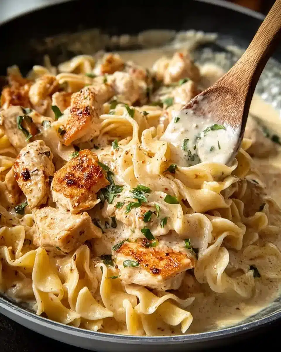 Delicious Marry Me Chicken Pasta served in a vibrant bowl garnished with herbs.