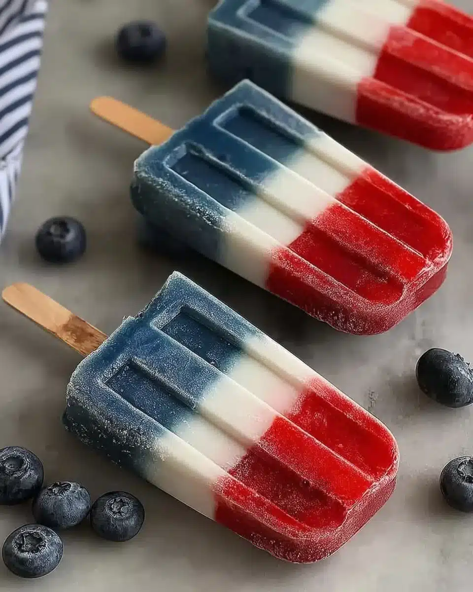 Patriotic red, white, and blue popsicles perfect for summer celebrations