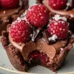 Delicious Raspberry Chocolate Mousse Cups garnished with fresh raspberries