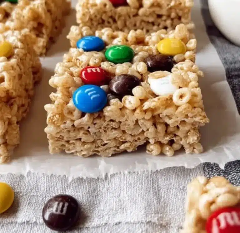 Rice Krispies treats with M&Ms on a plate