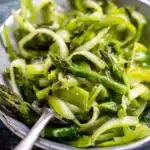 Delicious shaved asparagus salad topped with lemon and parmesan