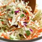 Fresh and colorful cabbage salad with vegetables in a bowl