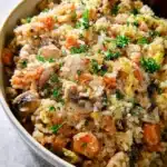 Delicious chicken rice casserole with chicken pieces and rice baked in a creamy sauce