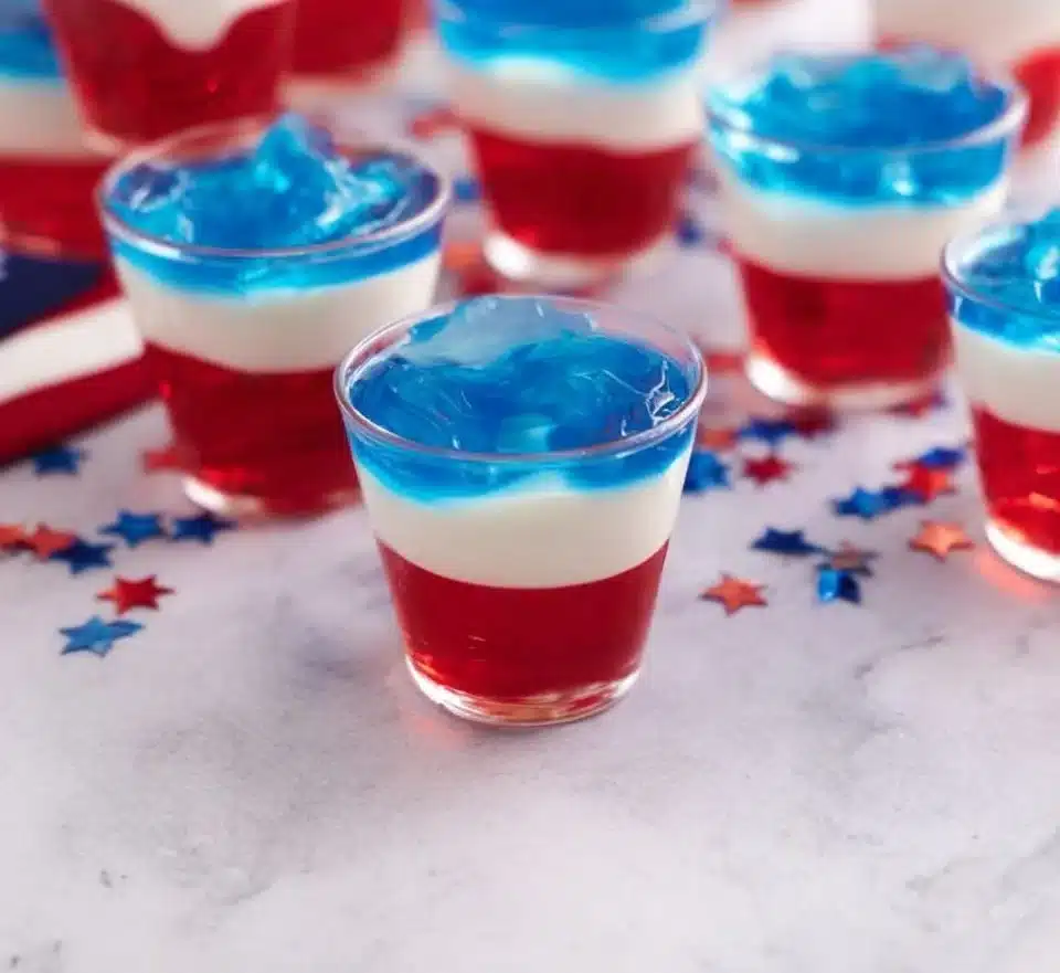 Colorful Jell-O shots served in vibrant cups for a festive celebration