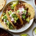 Delicious homemade lentil tacos served with fresh toppings.