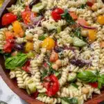 Colorful pasta salad loaded with vegetables and fresh dressing