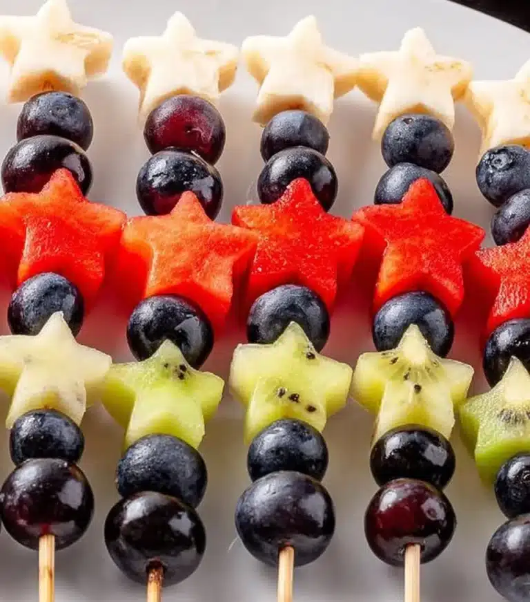 Colorful sparkler fruit skewers with fresh fruits for a vibrant party snack