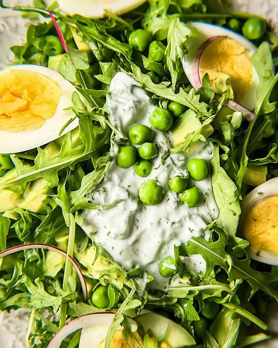 Fresh spring pea and arugula salad with colorful ingredients