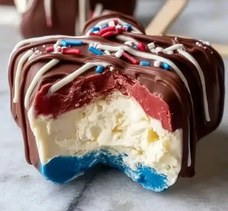 Star-shaped cheesecake pops decorated with colorful sprinkles