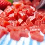 Delicious strawberry gummies in a colorful candy bowl