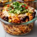 Healthy chicken enchilada bowl with cottage cheese and fresh toppings