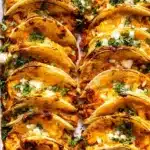Delicious homemade chicken tacos with fresh toppings on a colorful plate