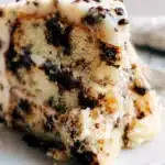 Delicious Cookie Dough Layer Cake with chocolate chips and frosting