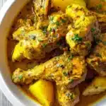 Delicious plate of homemade curry chicken served with rice.