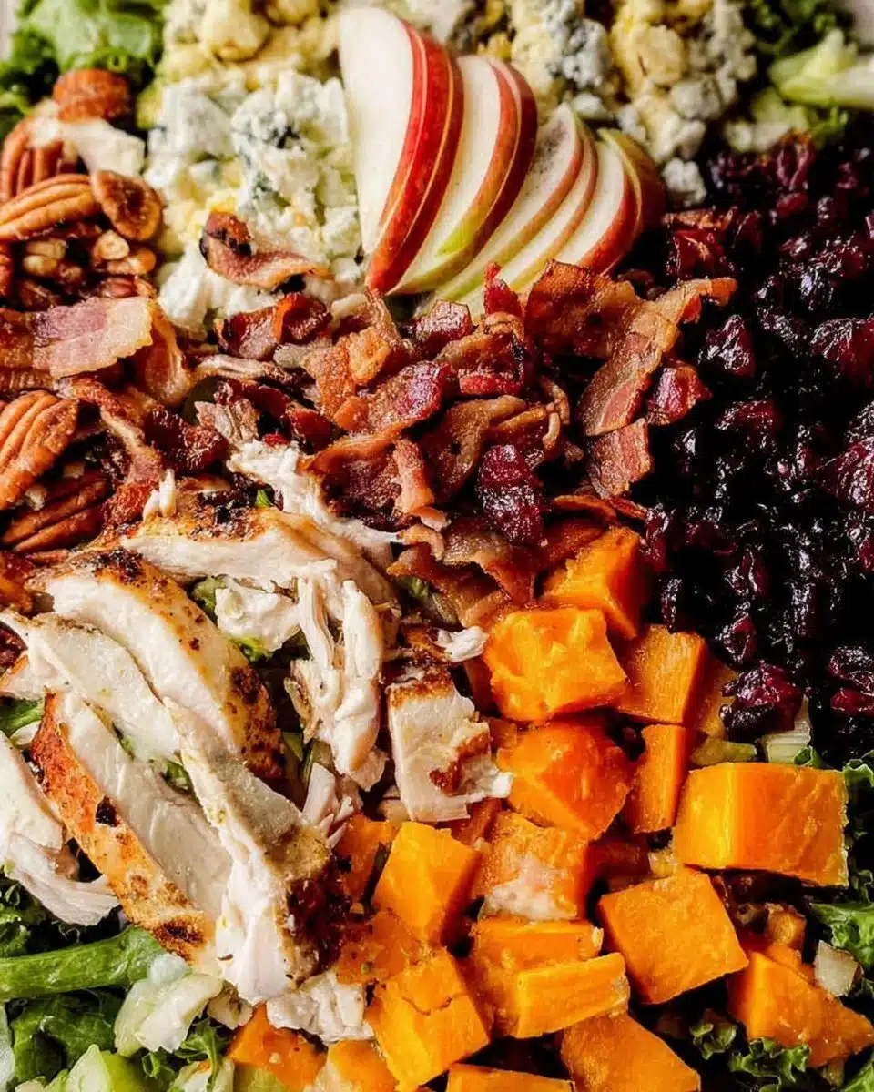 Harvest Cobb Salad featuring butternut squash, fresh greens, and colorful toppings