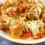 Savory sausage and peppers dish with colorful bell peppers and onions