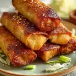 Delicious teriyaki chicken egg rolls served on a plate