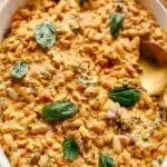 Delicious bowl of cooked white beans ready for a healthy meal.
