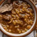 A delicious bowl of Argentine Locro, a traditional stew with meat and vegetables.