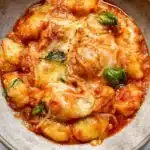 Deliciously baked gnocchi served with cheese and marinara sauce