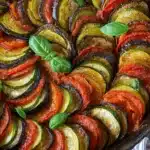 Delicious Baked Ratatouille with vibrant vegetables in a rustic dish.