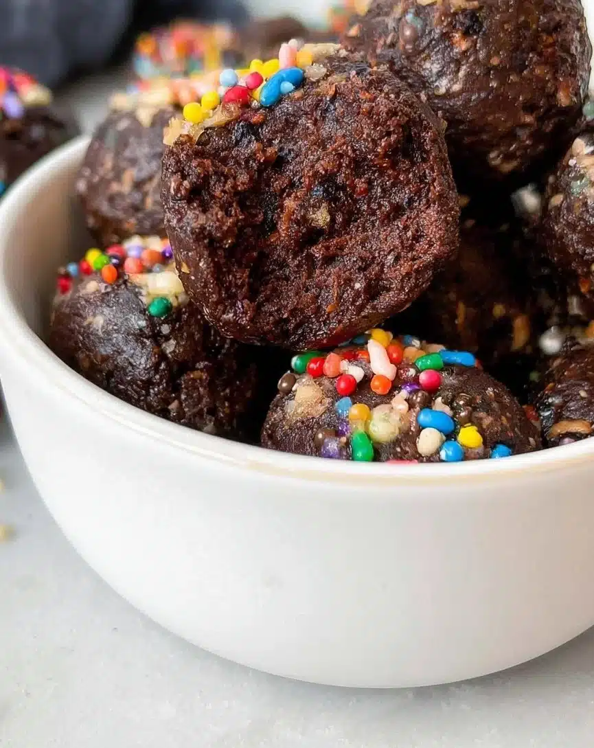Delicious homemade brownie bites on a white plate