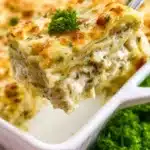 Delicious homemade Chicken Lasagna layered with cheese and savory chicken