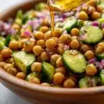 Fresh chickpea cucumber salad with vegetables and herbs