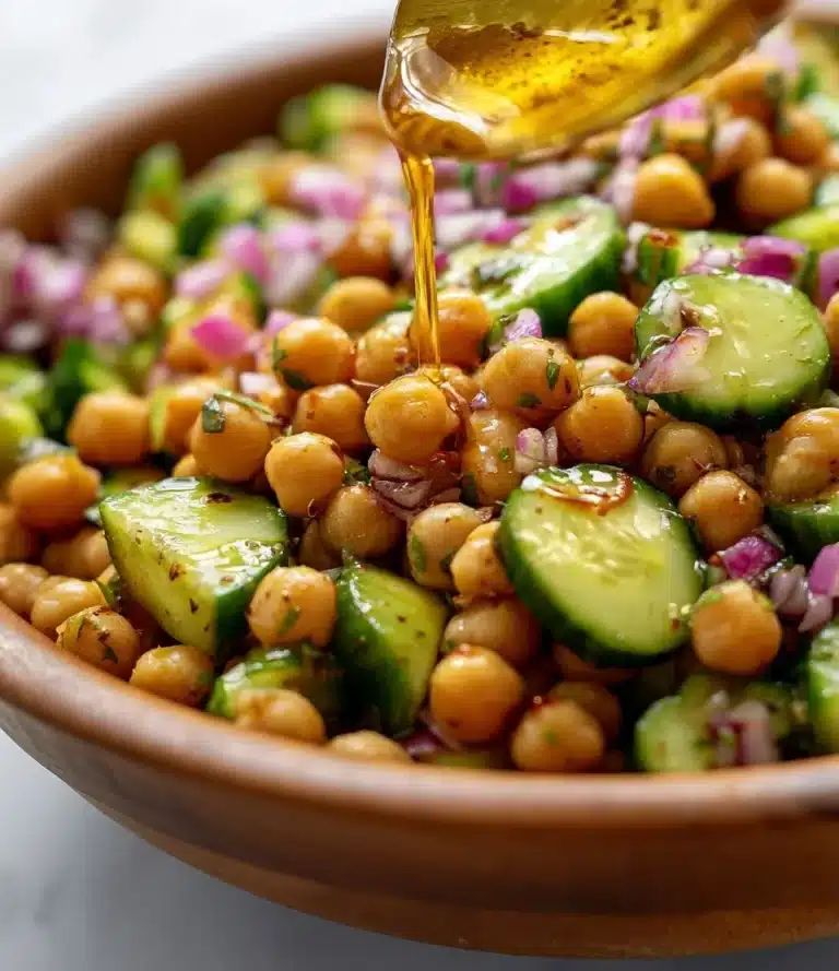 Fresh chickpea cucumber salad with vegetables and herbs