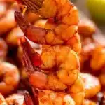 Grilled Chipotle Honey Shrimp Skewers garnished and ready to serve
