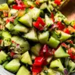 Fresh Cucumber Salsa with diced cucumbers, tomatoes, and herbs served in a bowl.