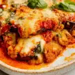 Deliciously baked Eggplant Parmesan with layers of cheese and marinara sauce