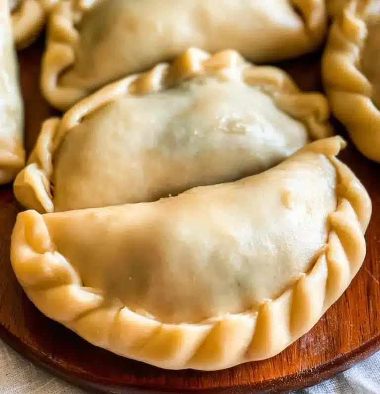 Homemade empanada dough ready for filling and baking